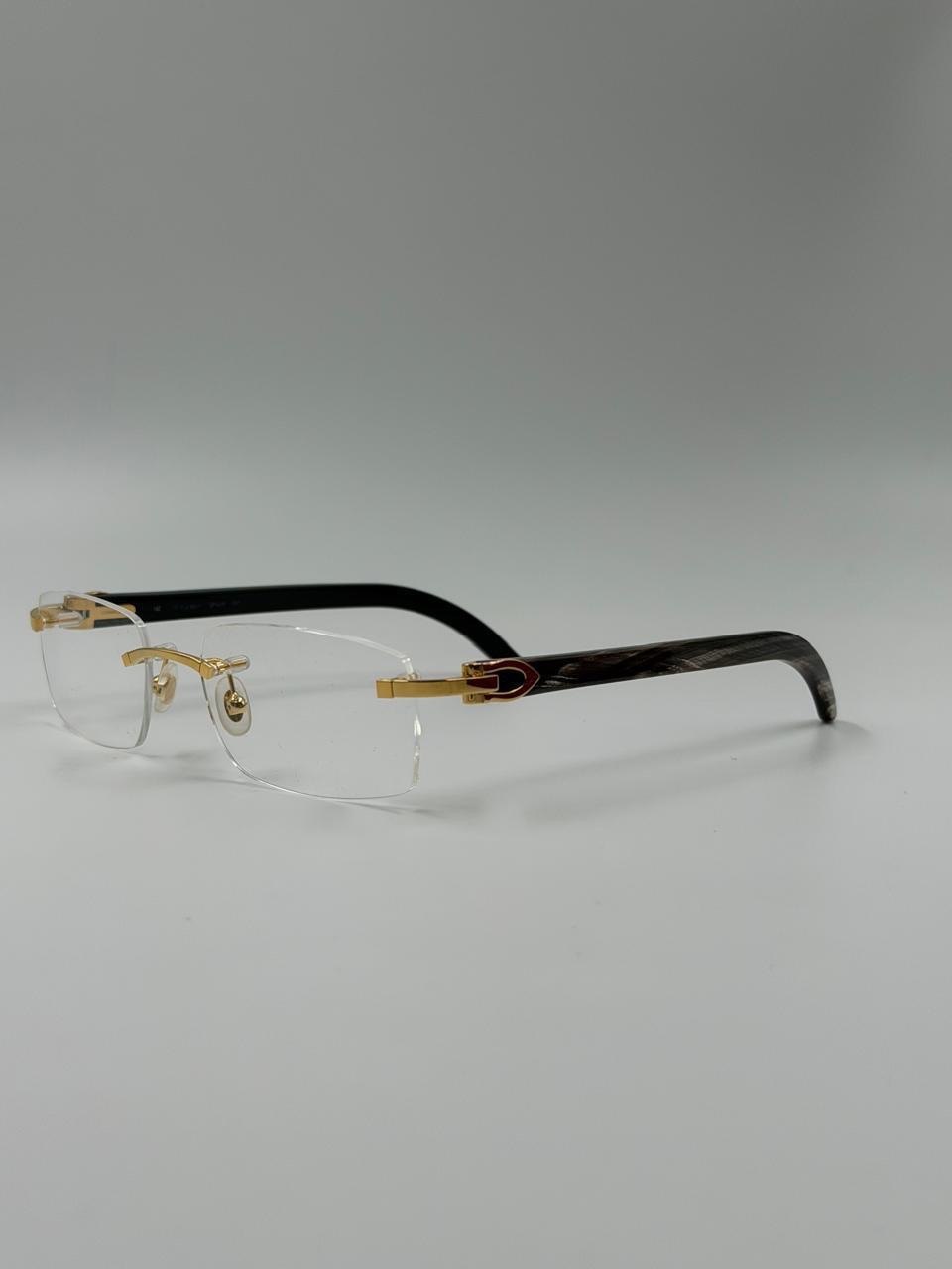 Slender glasses on a studio backdrop
