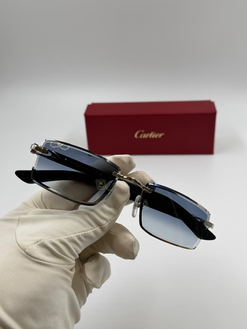 Eyewear and accessories on a studio surface
