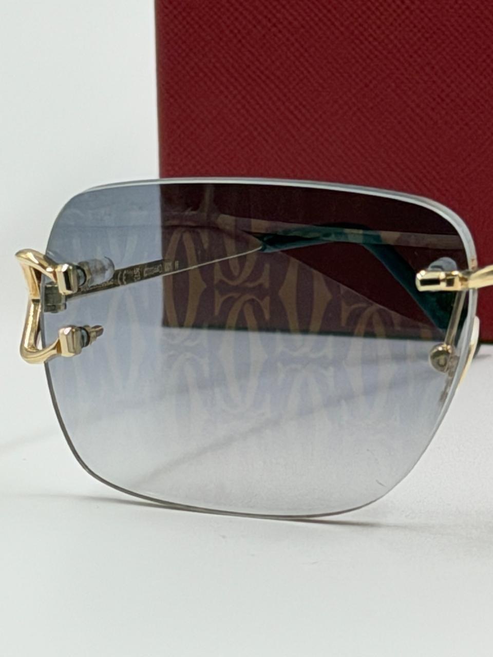 Dark-lensed glasses on a studio background