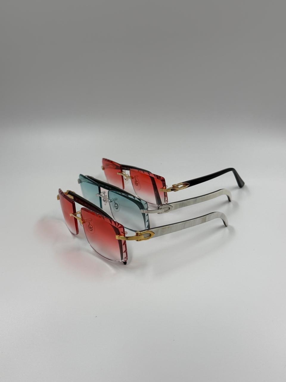 Brightly coloured eyewear arranged on a display