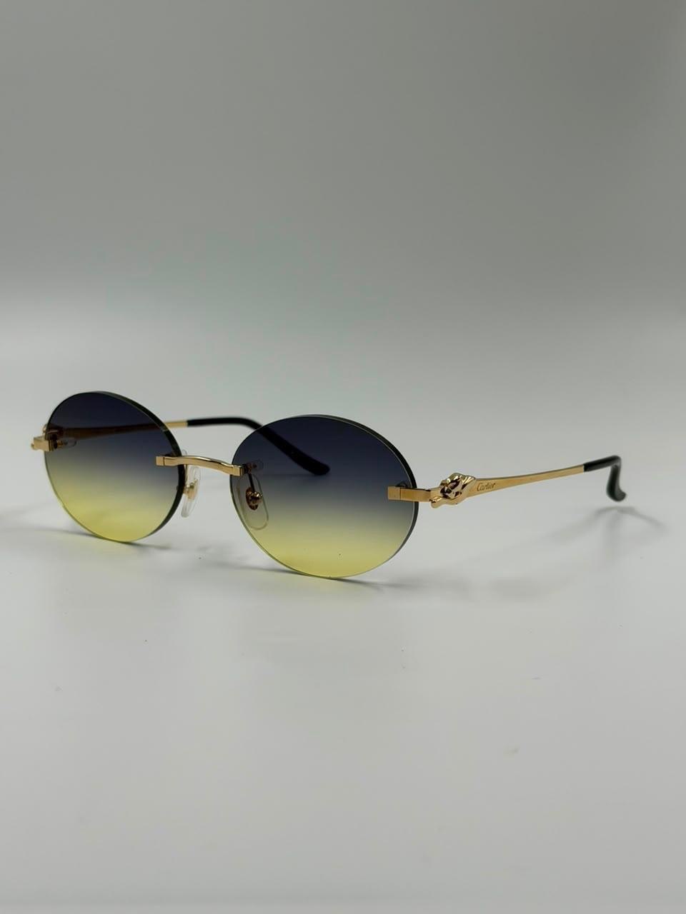 Gradient-lens sunglasses on a studio backdrop
