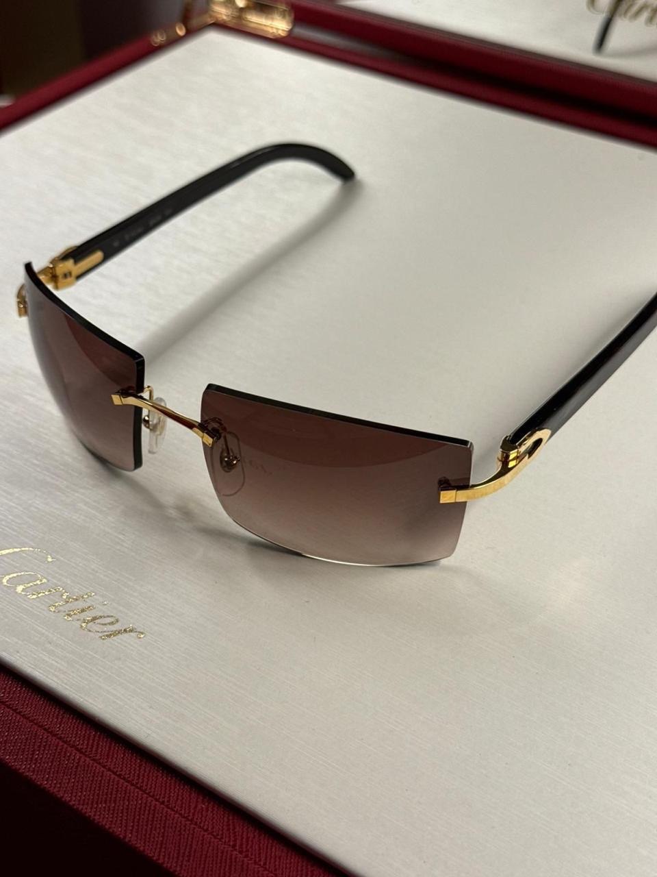 Eyewear arranged inside an open case
