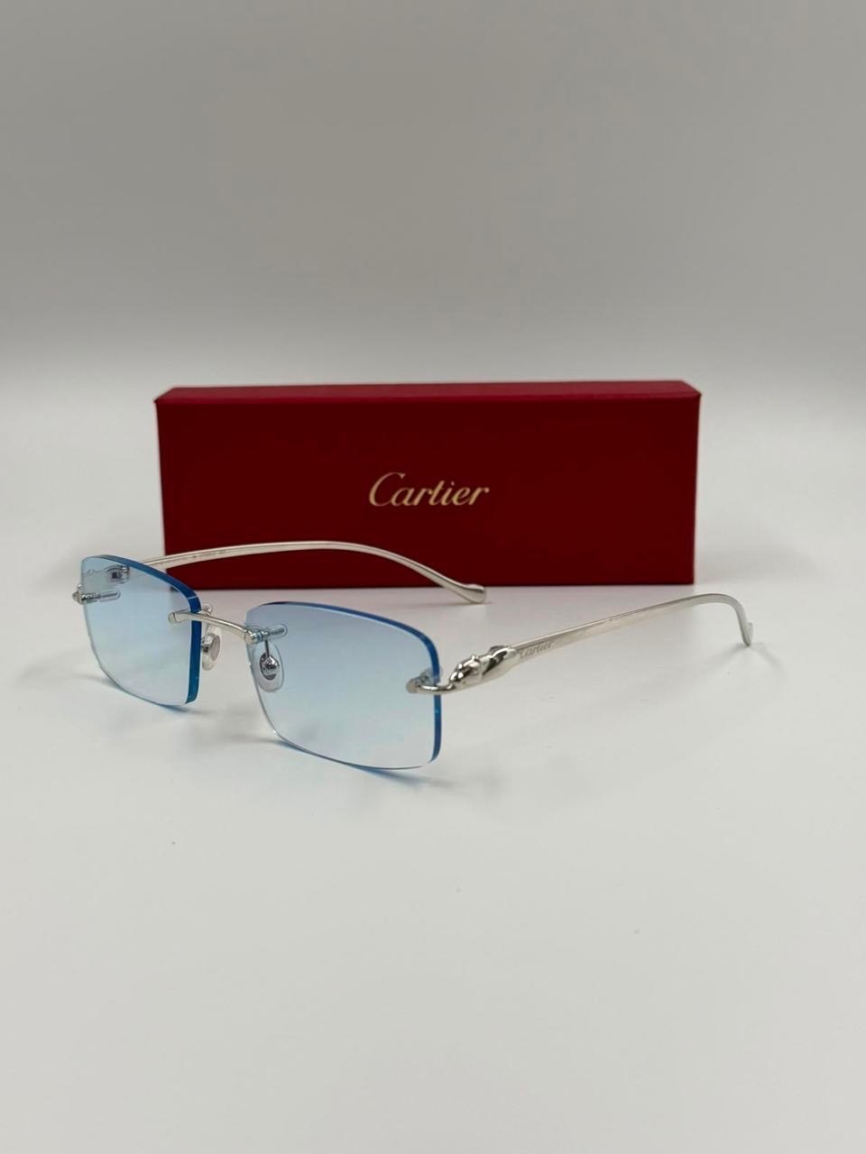 Warm-tinted glasses on a studio backdrop