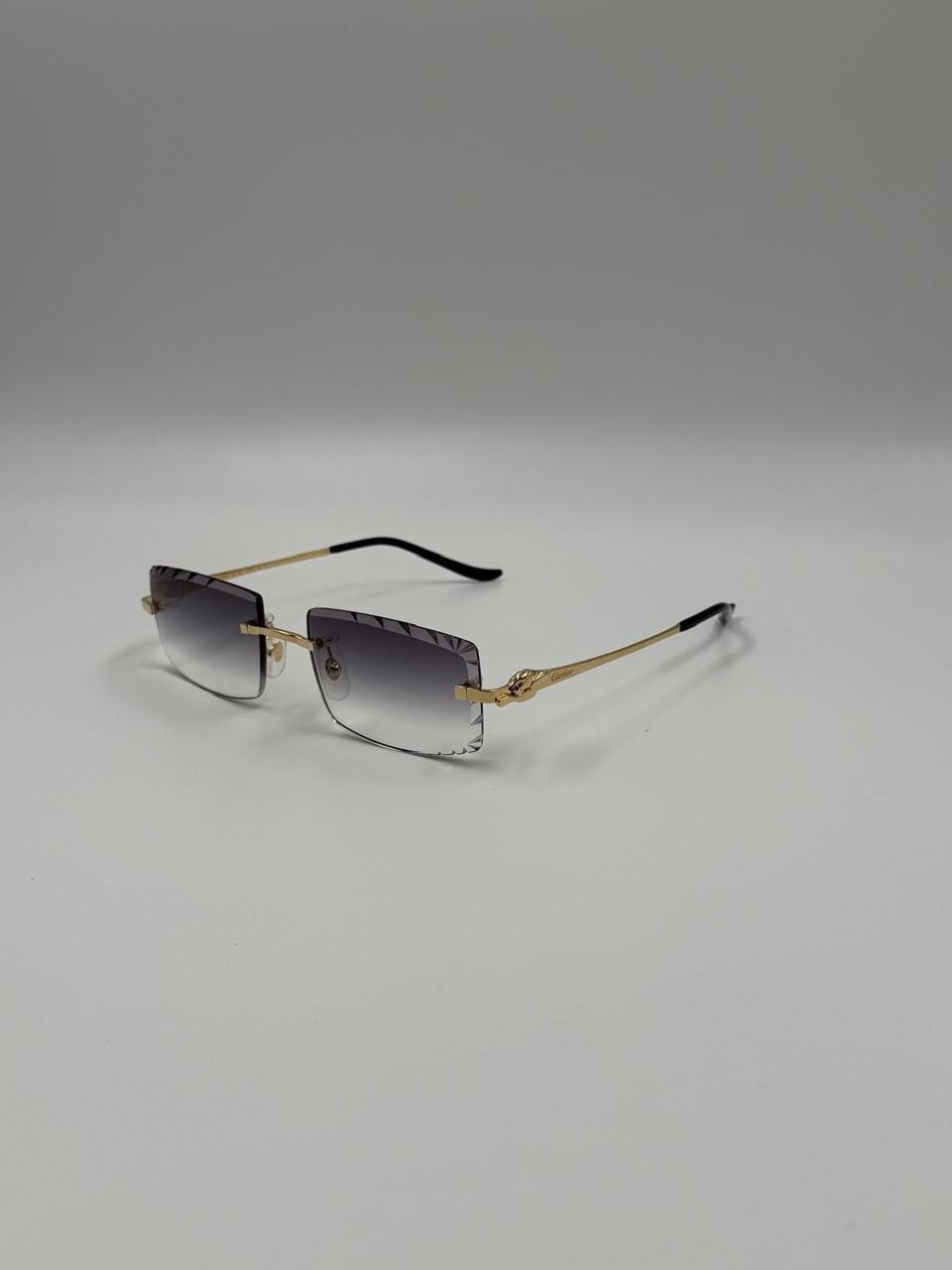 Pale-lensed sunglasses with a slender frame